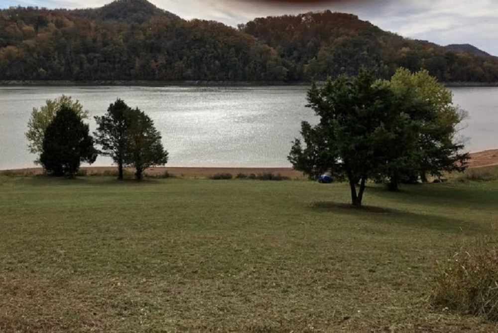 Real Estate Listing Cherokee Lakefront Lot Level to Water!